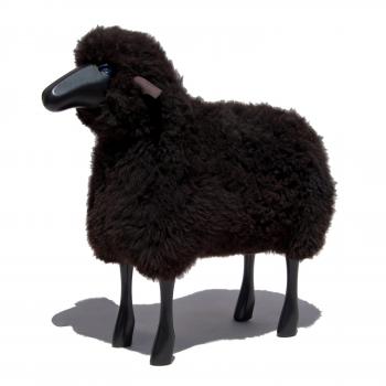 sheep, curly brown fur, black coloured wood