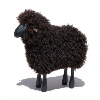 lamb, curly brown fur, black coloured wood